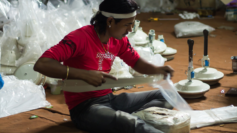 person packaging ceiling fan