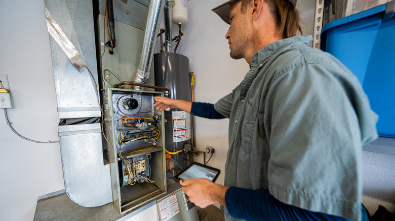 Man repairing a furnace