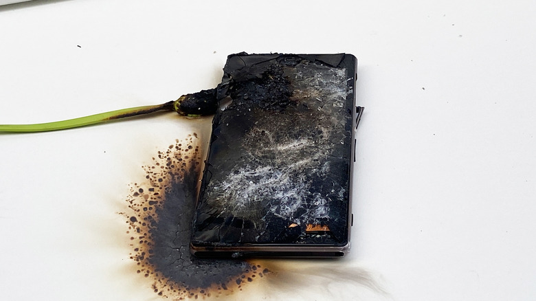 melted phone and charger after catching on fire