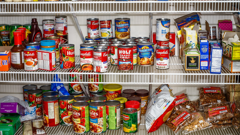 Disorganized pantry shelves