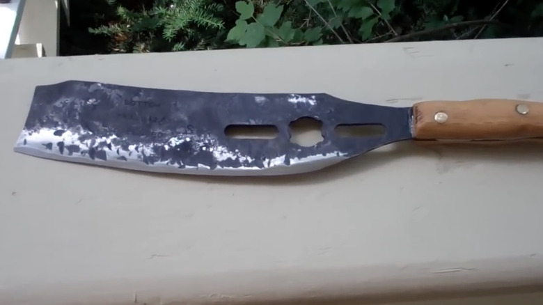 A useful machete-style garden tool made from an old mower blade