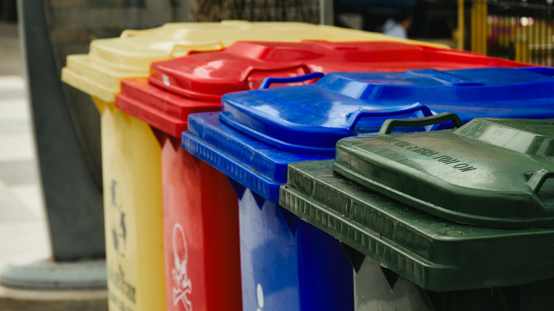 Outdoor trash cans with their lids closed