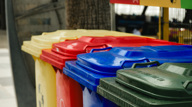 Outdoor trash cans with their lids closed