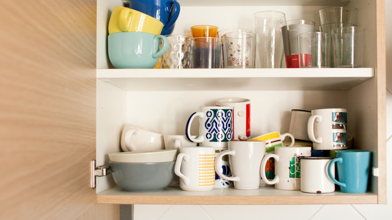 stacked mugs in shelf