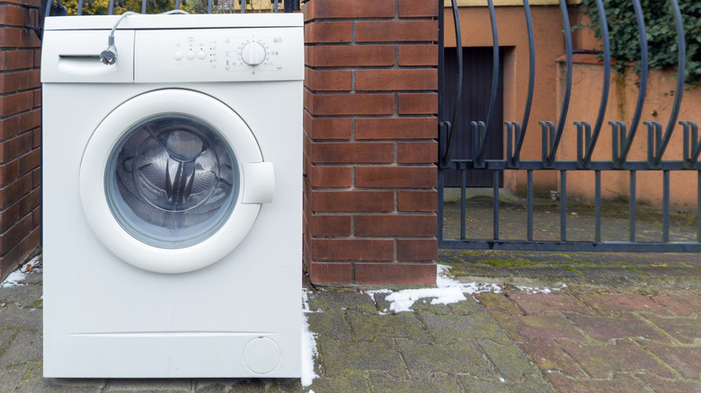 Close up of broken washing machine