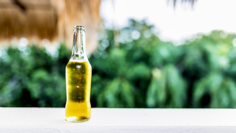 Close up of beer bottle on balcony
