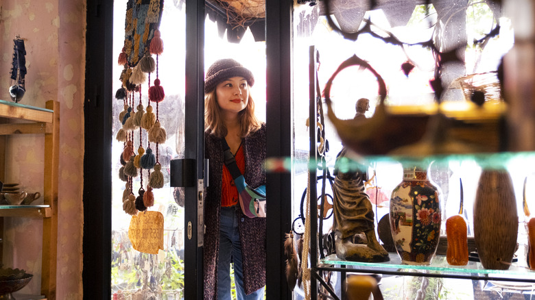 Woman shipping for vintage homewares