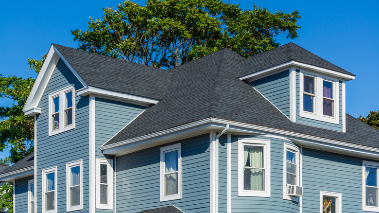 Beautiful family house with blue siding and white trim