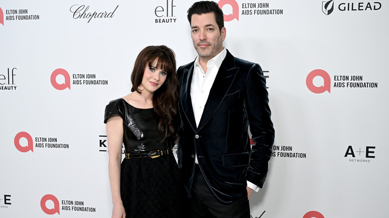 Zooey Deschanel and Jonathan Scott attend the Elton John AIDS Foundation's 33rd Annual Academy Awards Viewing Party on March 02, 2025 in West Hollywood, California.