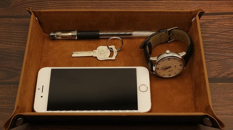 Phone and keys in tray