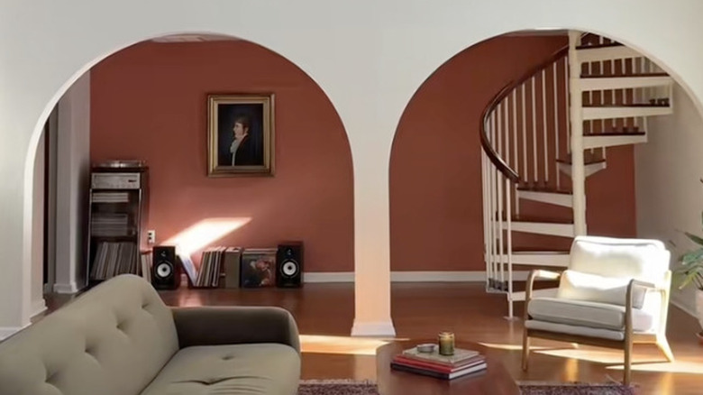 A DIY double-arched room divider in a loft-style space