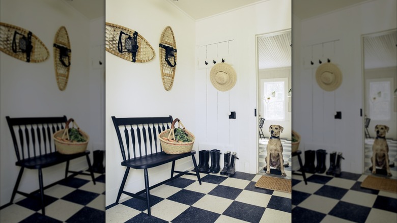 Mudroom with snow shoes displayed on the wall