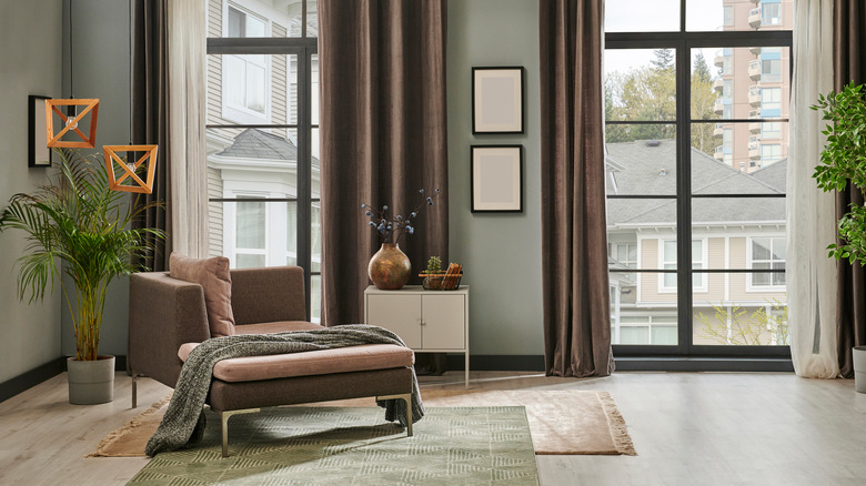 White and brown curtains on large windows