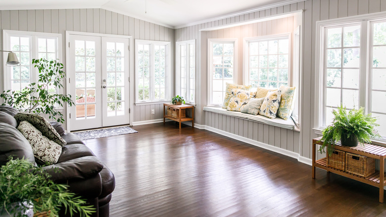 sunroom with windows and reading bench