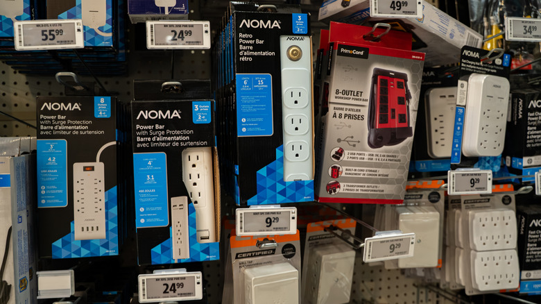 Selection of power strips and surge protector at a store