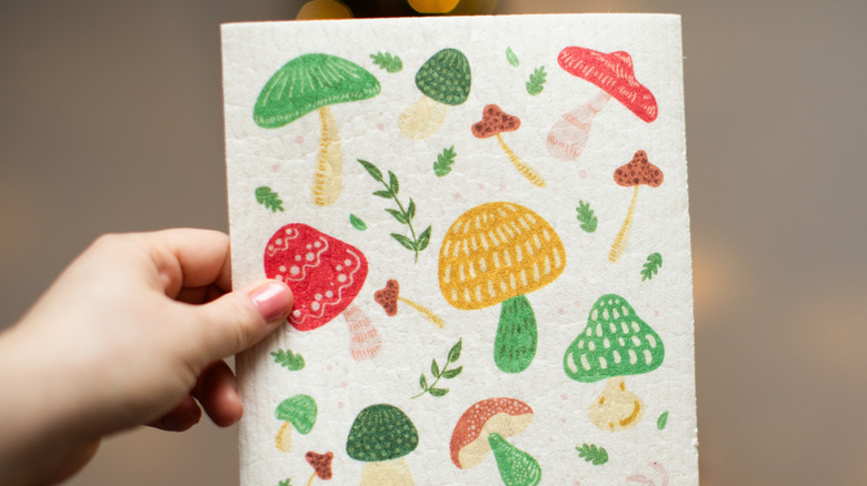 Someone holding a Swedish dishcloth