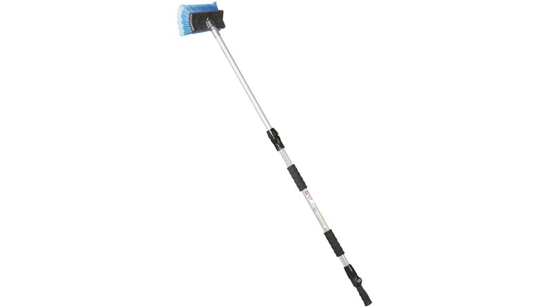 Telescoping brush with blue bristles on white background