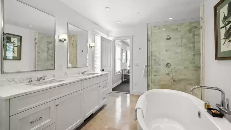 all white bathroom with tub