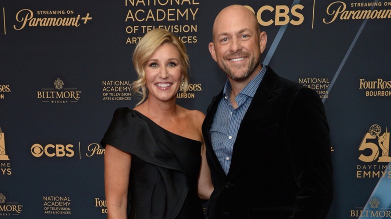 Jenny and Dave Marrs smiling in formal wear