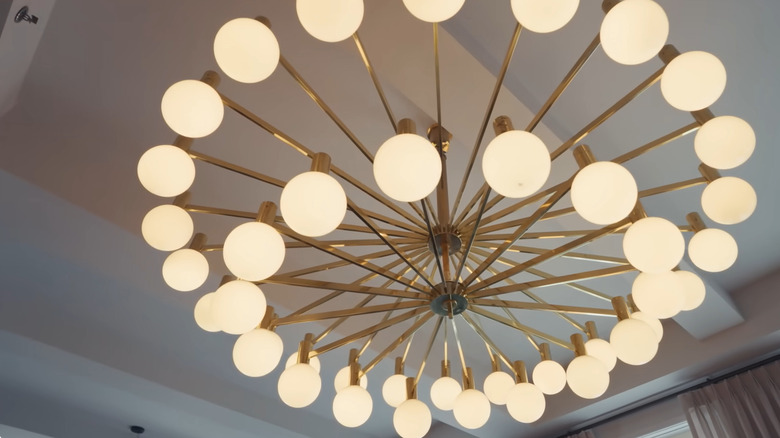 A chandelier in the living room of Bobby Flay's New York City apartment.