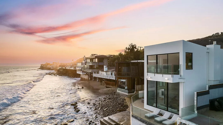 Beach front mansions at sunset