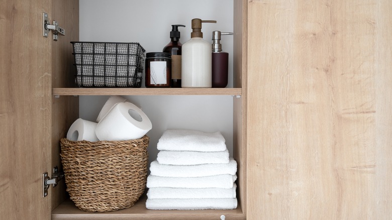 Bathroom cabinet with toiletries