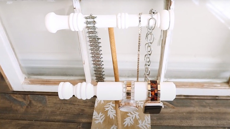 White wooden spindle jewelry holder