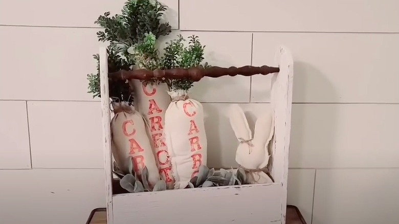Wooden toolbox with a spindle handle with decor inside
