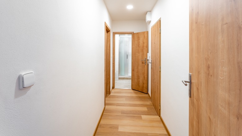 Plain hallway with recessed lighting
