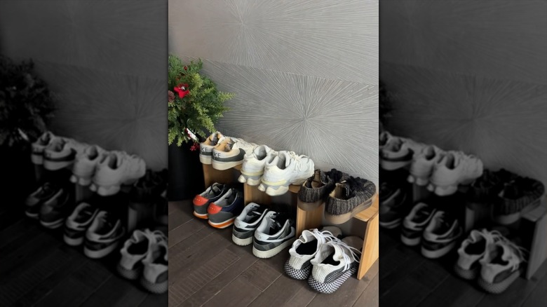 A shoe cubby made from Dollar Tree cutting boards