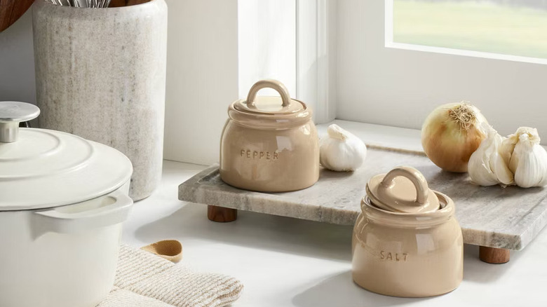 Hearth & Hand's Footed Marble Countertop Tray used on a kitchen counter.