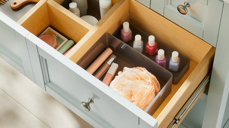 The inside of a drawer organized with Brightroom's Plastic Bathroom Trays.