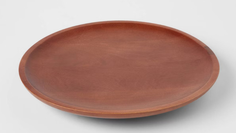 A few snacks displayed on Threshold's Wood Signature Round Lazy Susan.