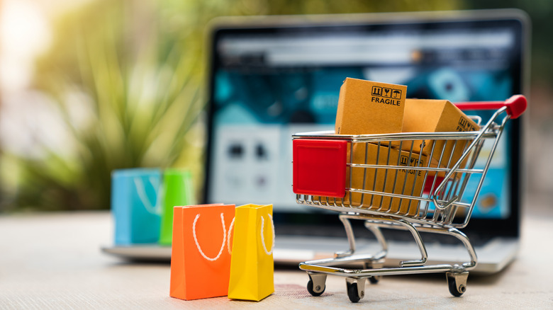 laptop with mini shopping cart