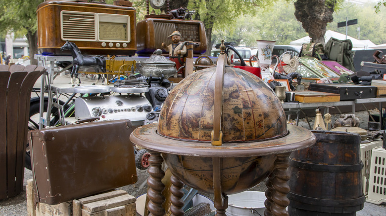 Vintage objects on a flea market stall.