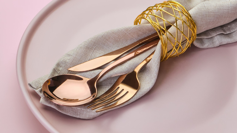 Place setting with rose gold utensils