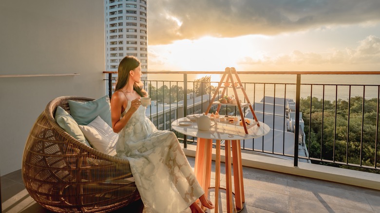 Woman sitting on a balcony