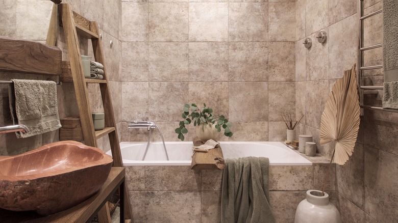 Organic-style bathroom with stone finishes