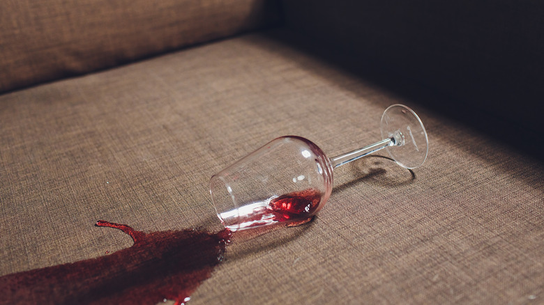 Red wine spilled on couch