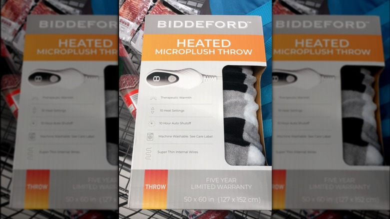 Black and white plaid Biddeford Heated Throw in box