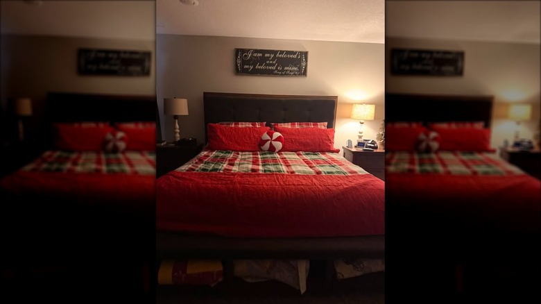 6 Piece Reversible Comforter & Coverlet Set in red, white, and green plaid print on bed