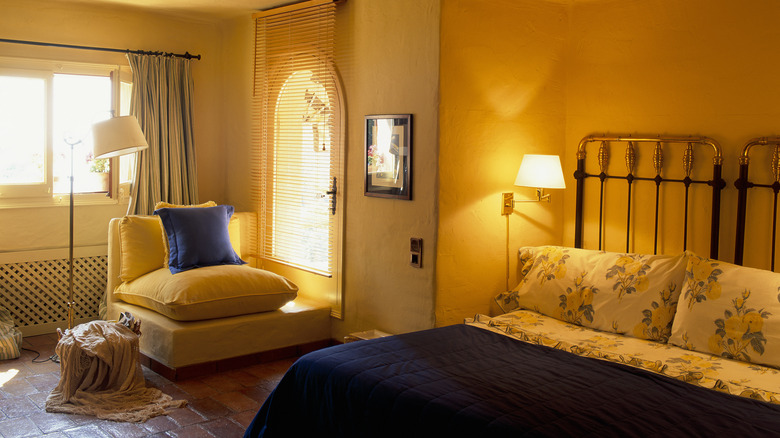 A bedroom with a warm feel.