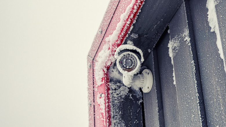 Security camera covered with snow and ice