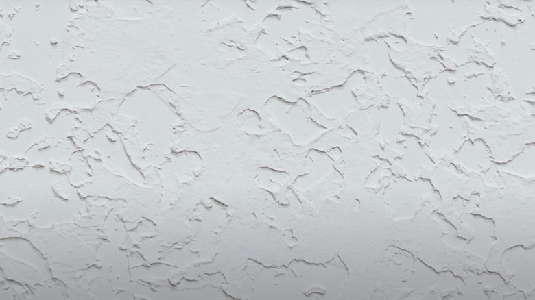 A hand brocade ceiling texture is shown in detail