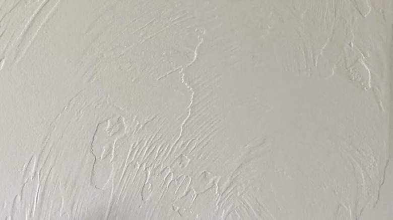 A Santa Fe ceiling texture is shown in a detail shot