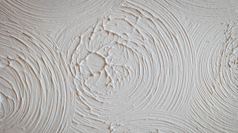 A swirl ceiling texture is shown in detail