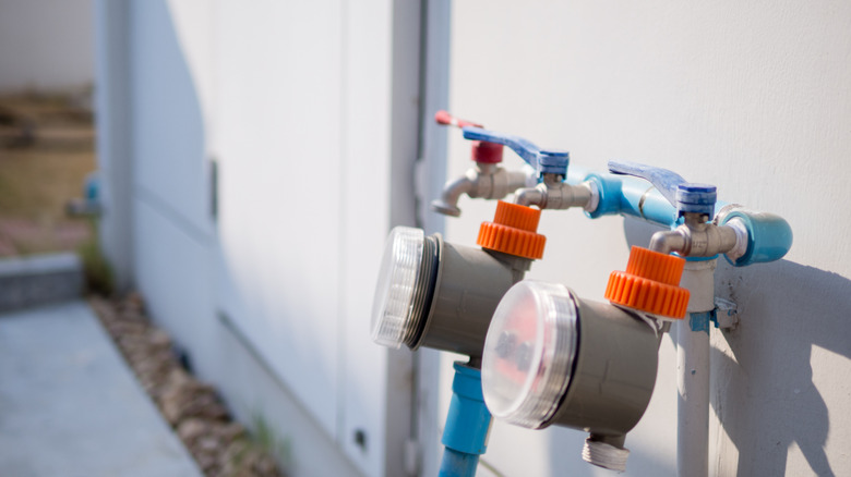 Faucets with gardening timer on the wall