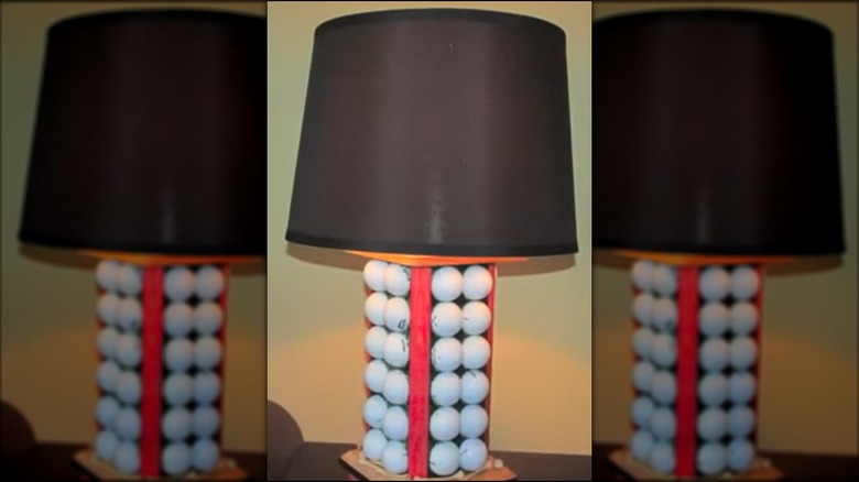lamp made with four panels of golf balls held in glittery resin