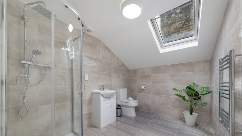 Skylight in a spacious bathroom with minimal decor