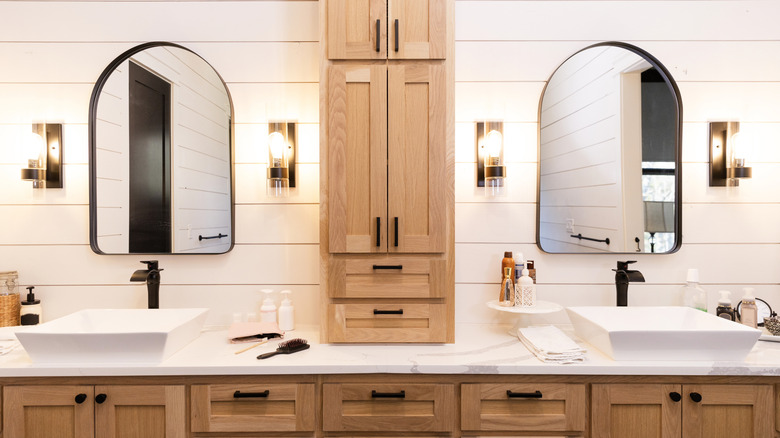 Individual framed mirrors over white double sink vanity